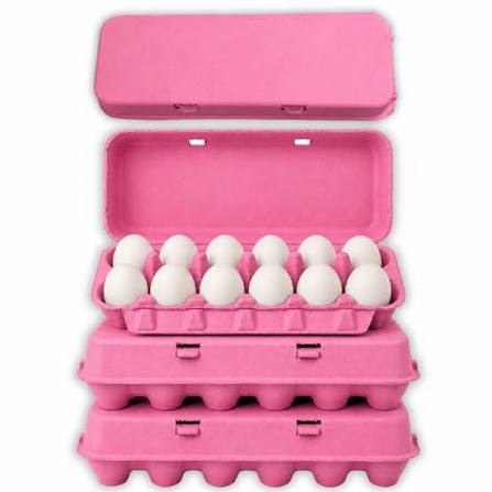 Pink egg cartons in molded pulp holding white eggs with the lid open